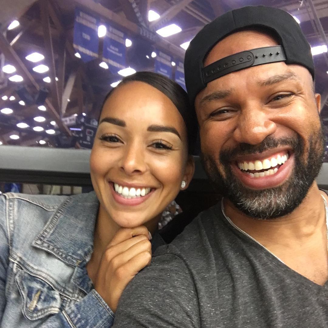 费舍尔和女友现场观看湖人对阵勇士的比赛