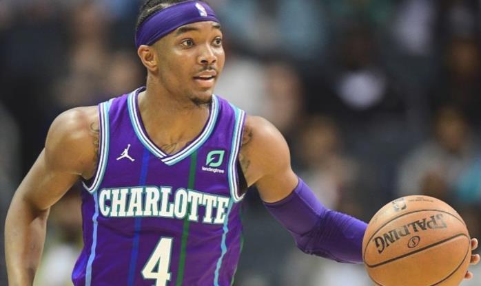 格雷厄姆与公益组织合作为夏洛特有需要的家庭送去食物