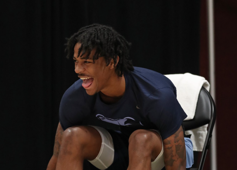 灰熊晒球员训练照并附文：去成为别人为之微笑的理由吧